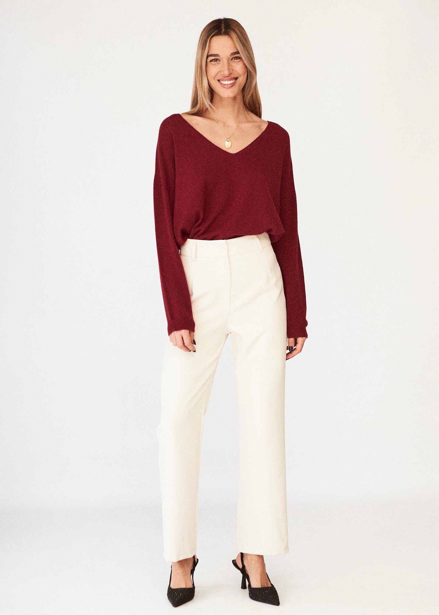 Seamless point-neck sweater