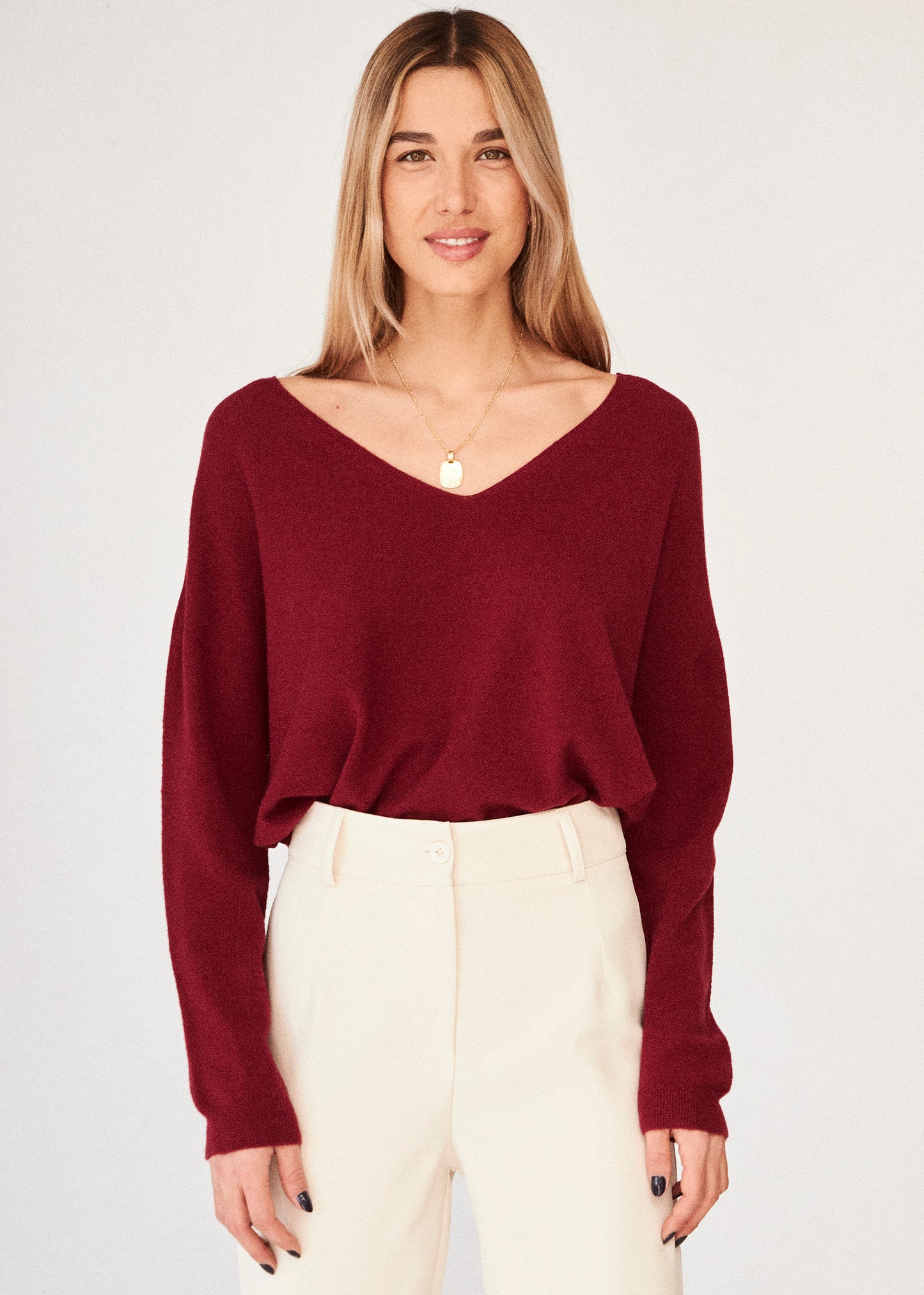 Seamless point-neck sweater