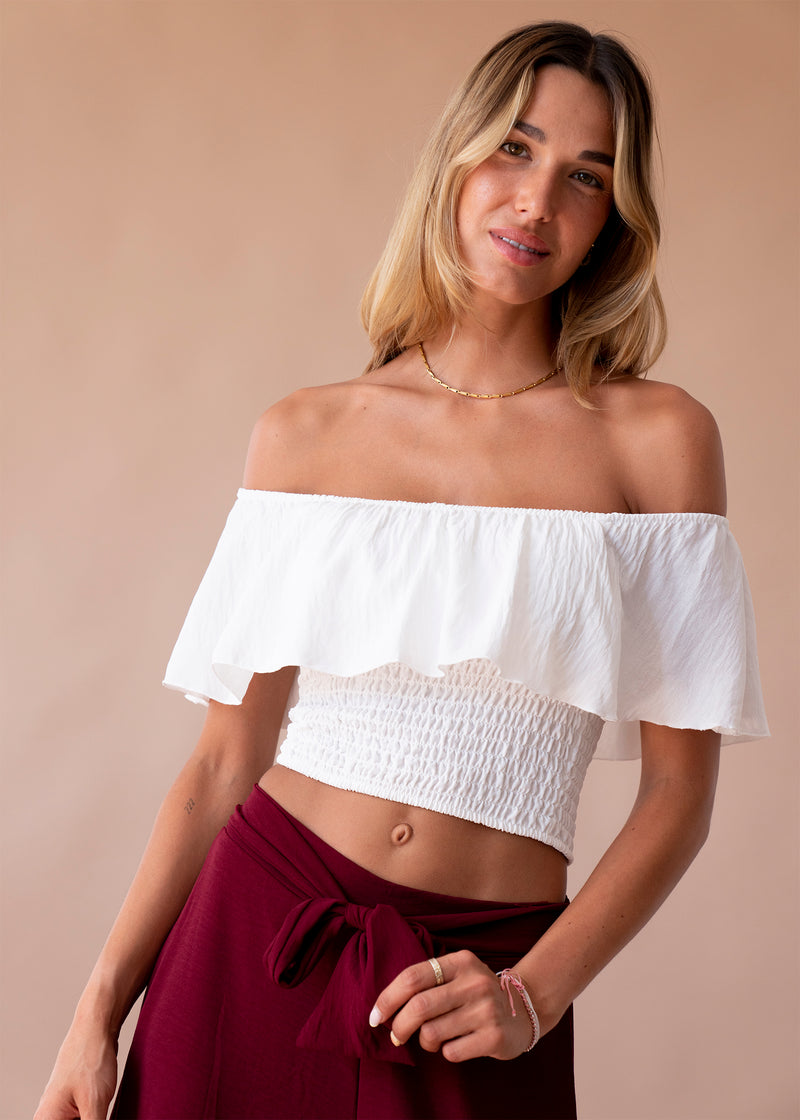 Top fluido volante fruncido