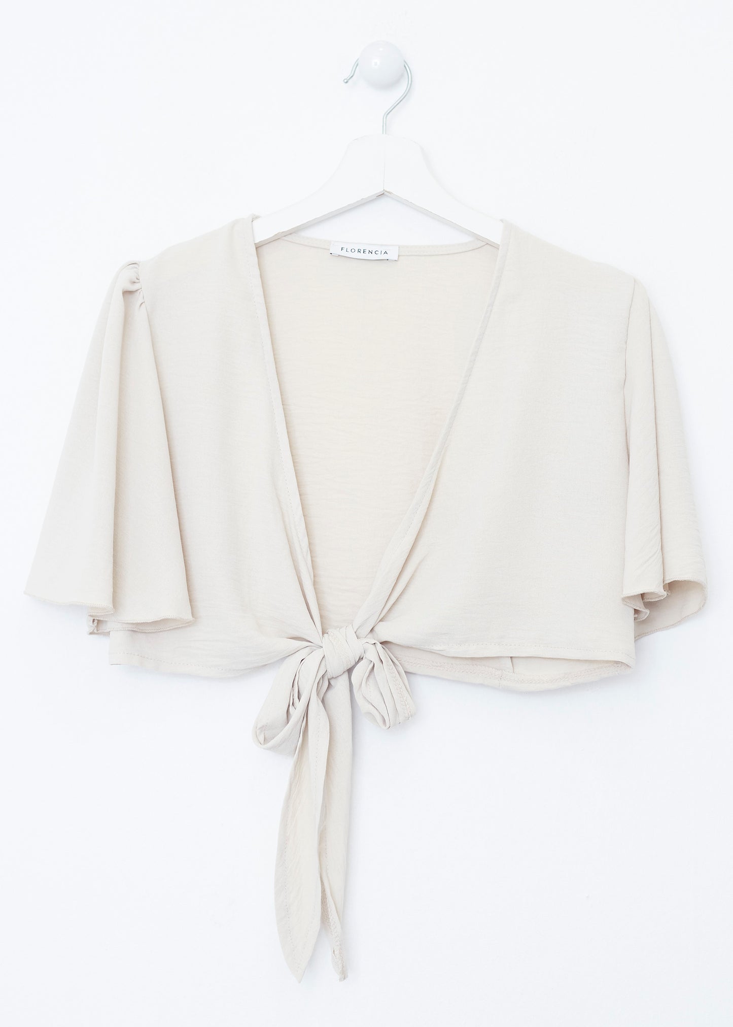 Flowing bolero with bow