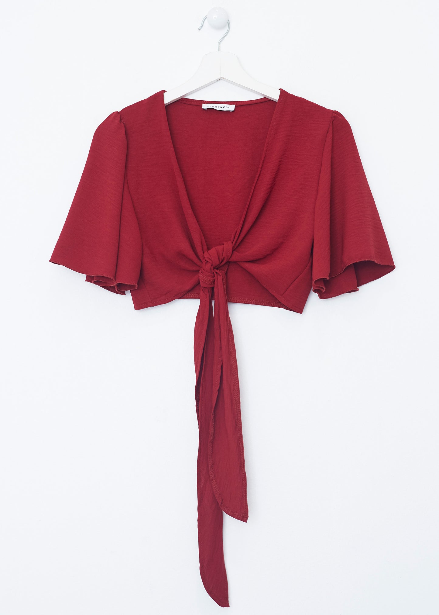 Flowing bolero with bow