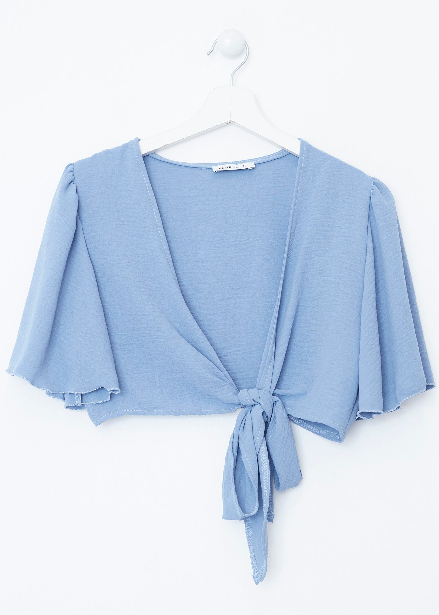 Flowing bolero with bow