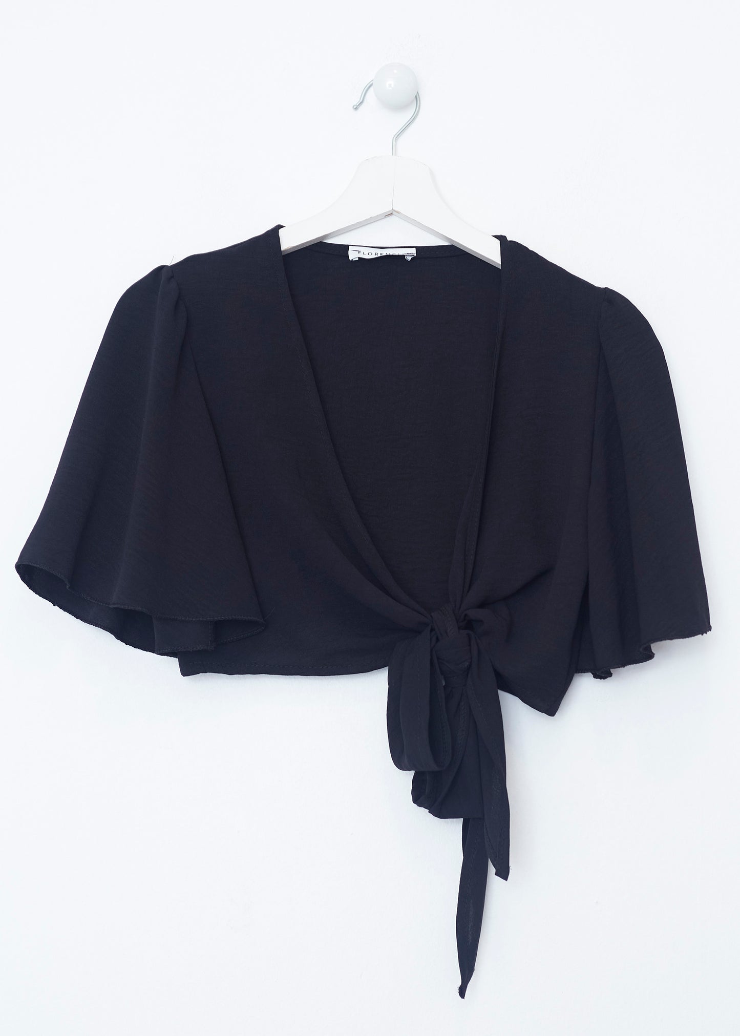 Flowing bolero with bow