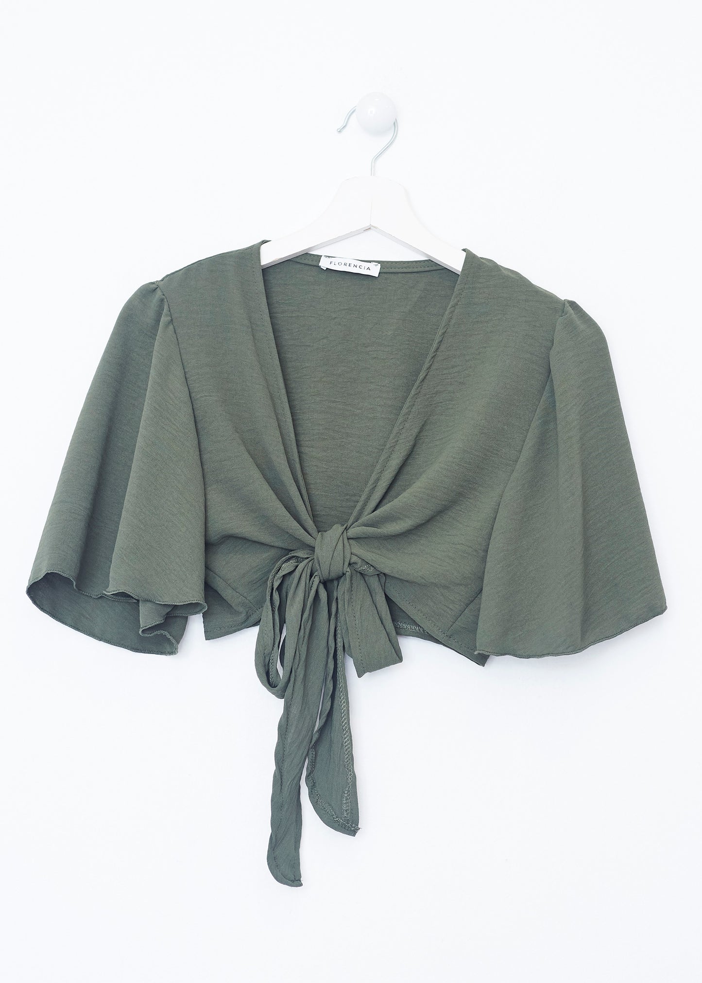 Flowing bolero with bow