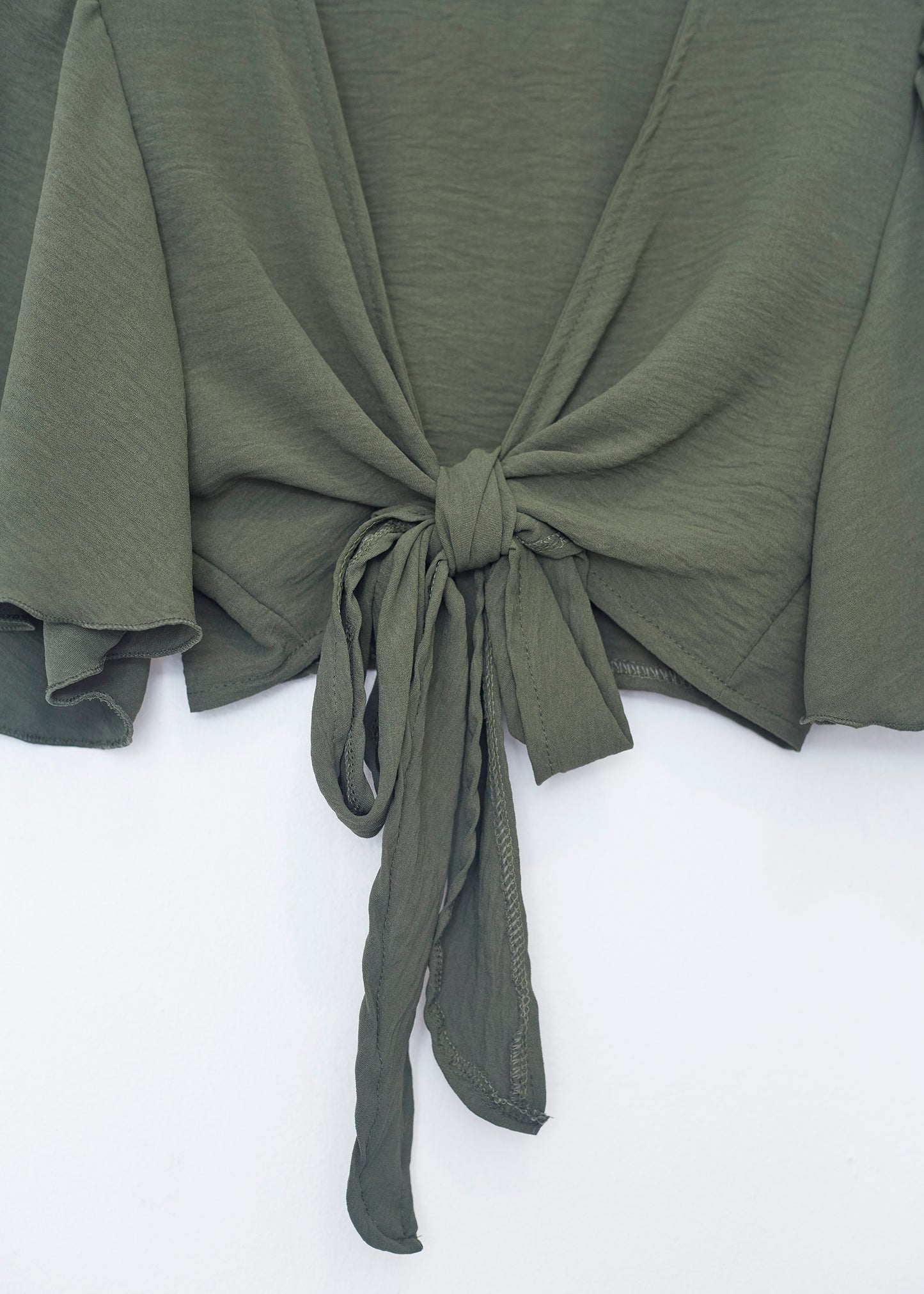 Flowing bolero with bow