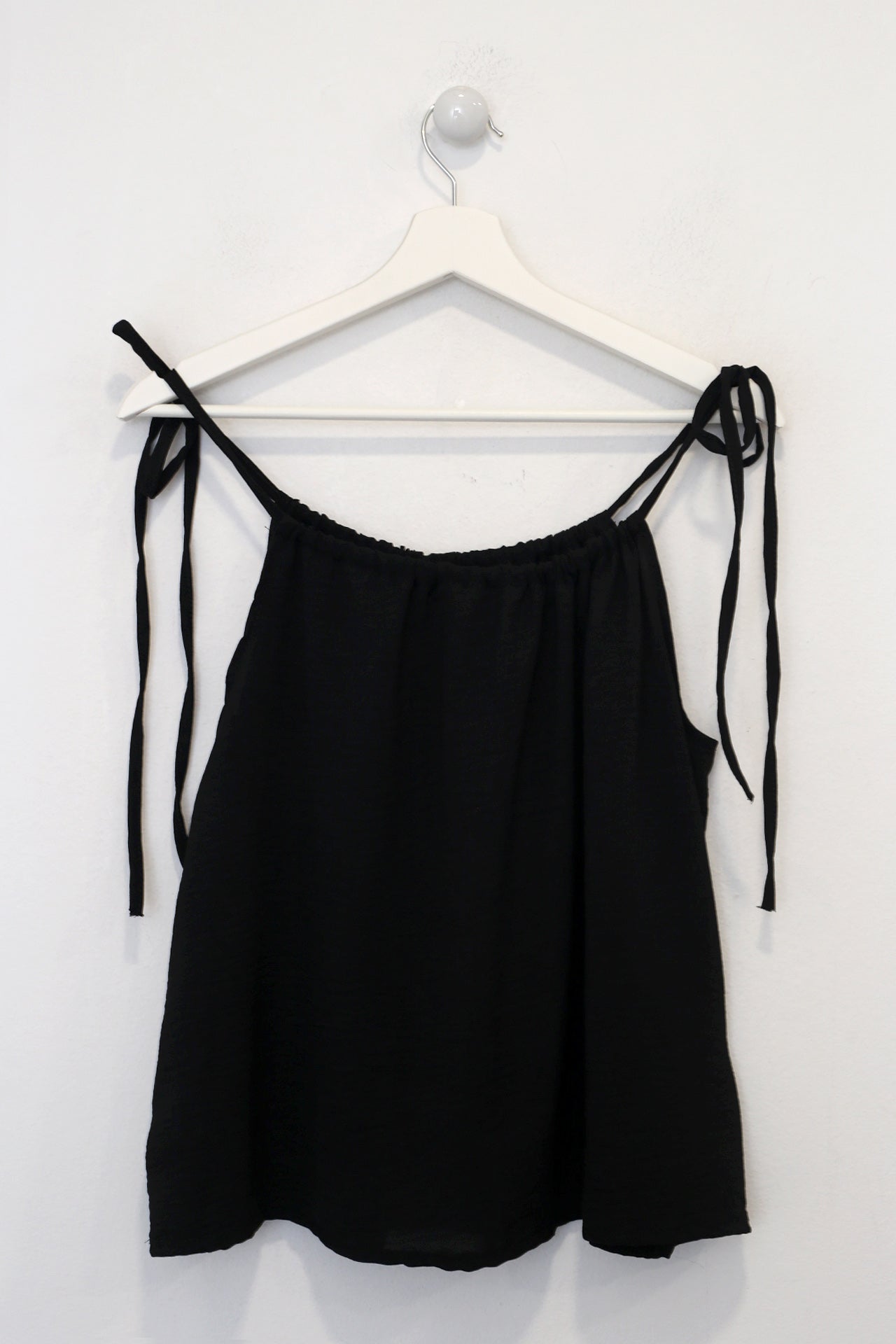 Top fluido tirantes