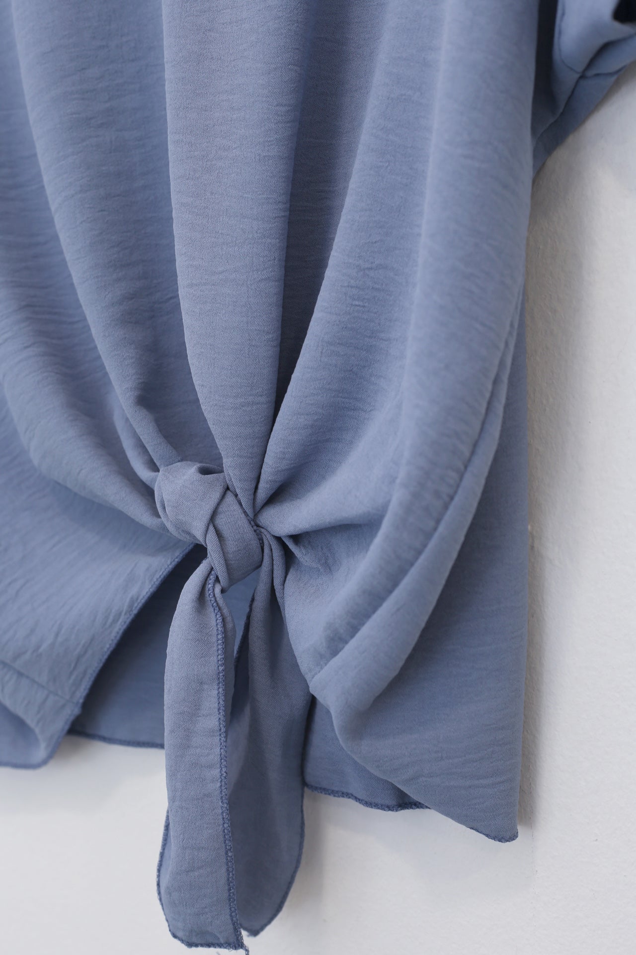 Blusa fluida nudo