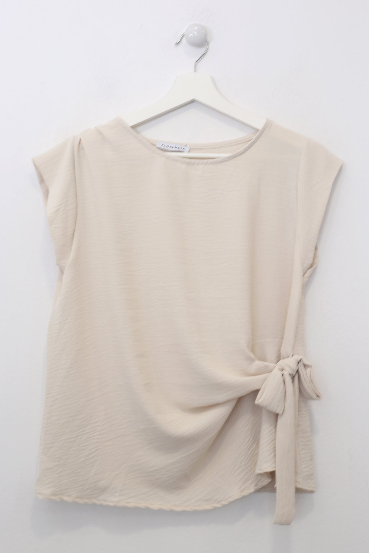 Top nudo fluido