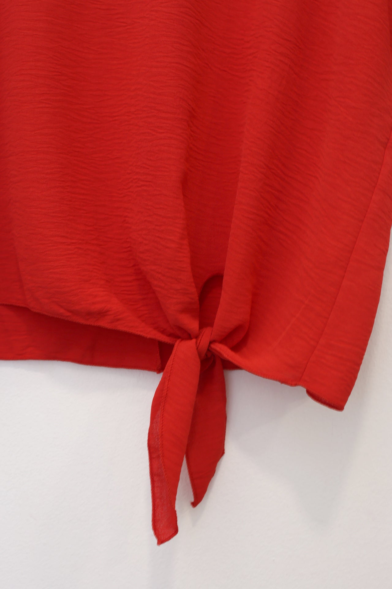 Blusa fluida nudo