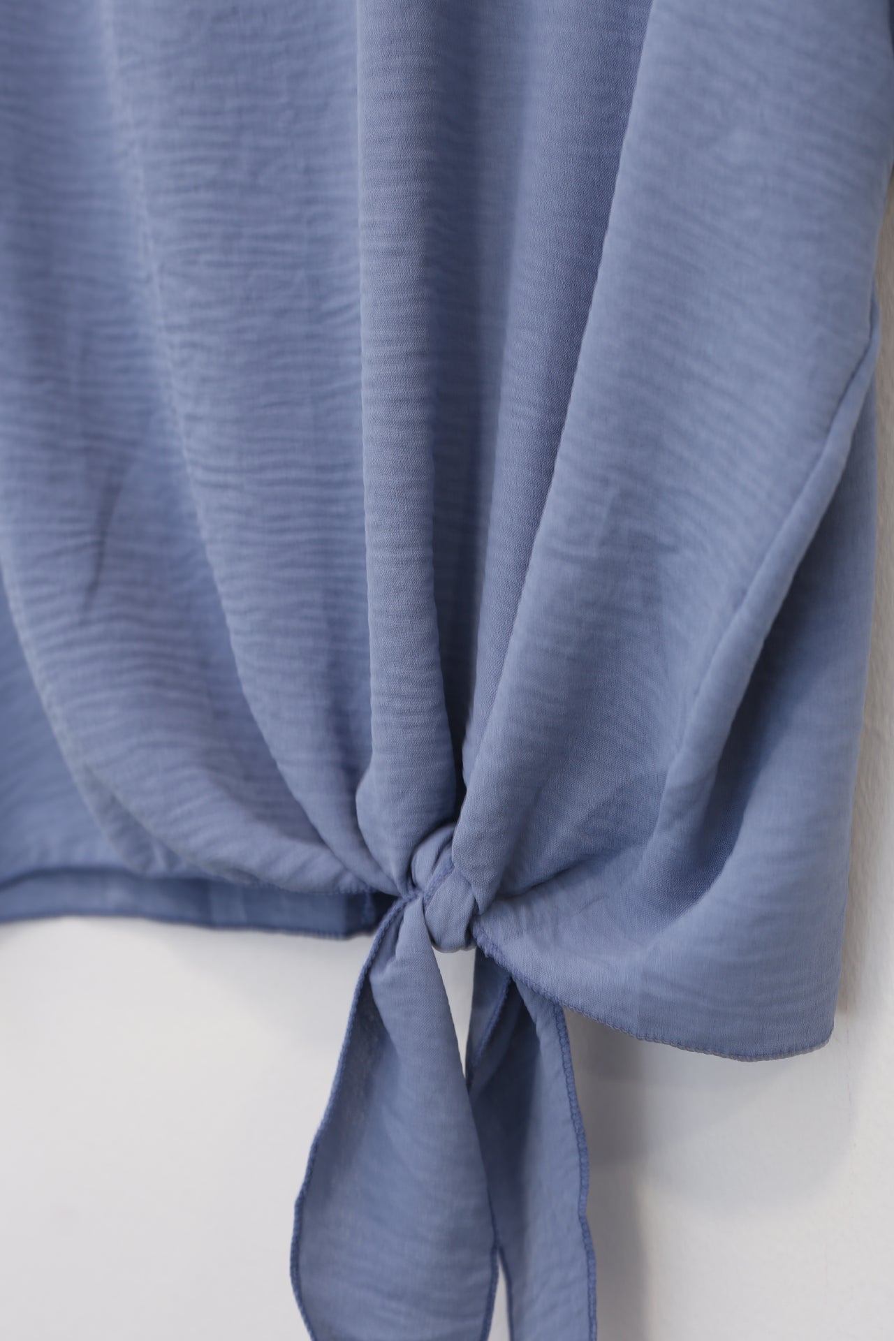 Blusa fluida nudo