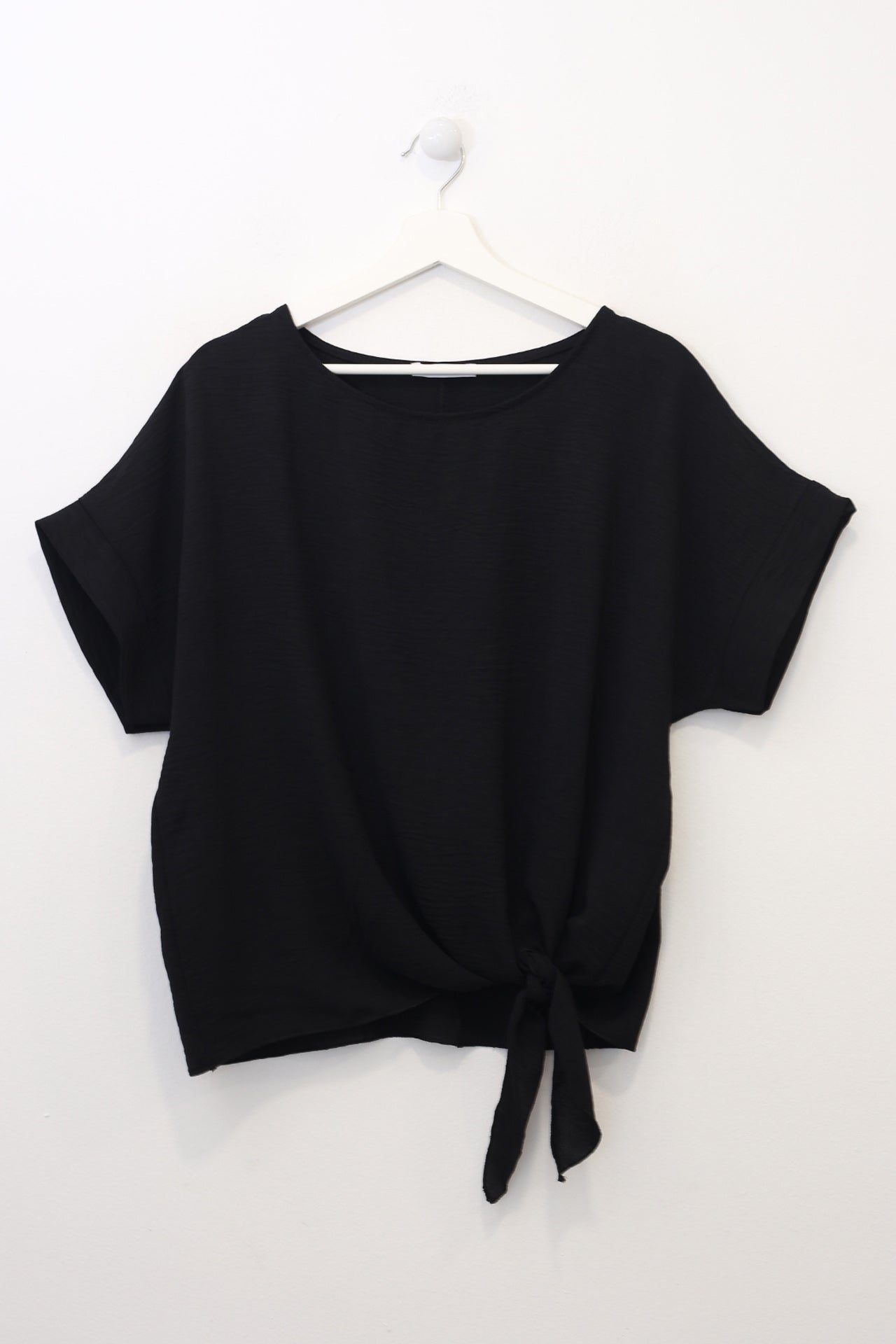 Blusa fluida nudo