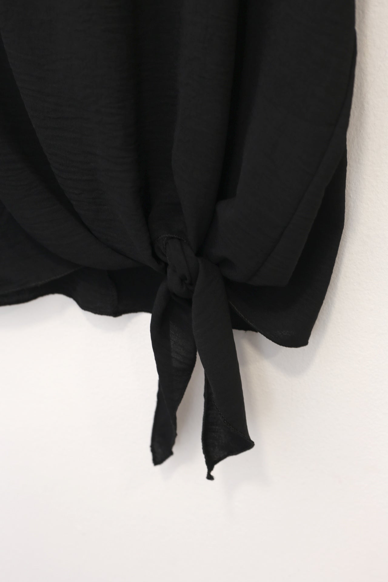 Blusa fluida nudo