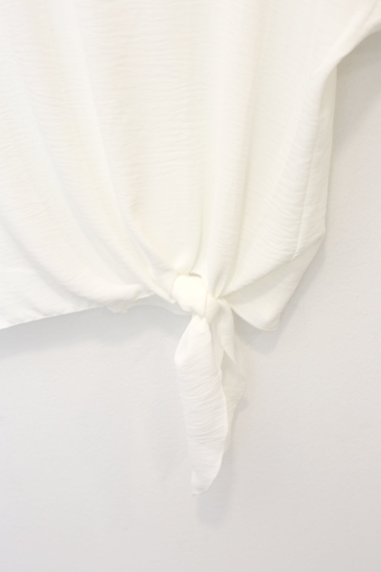 Blusa fluida nudo