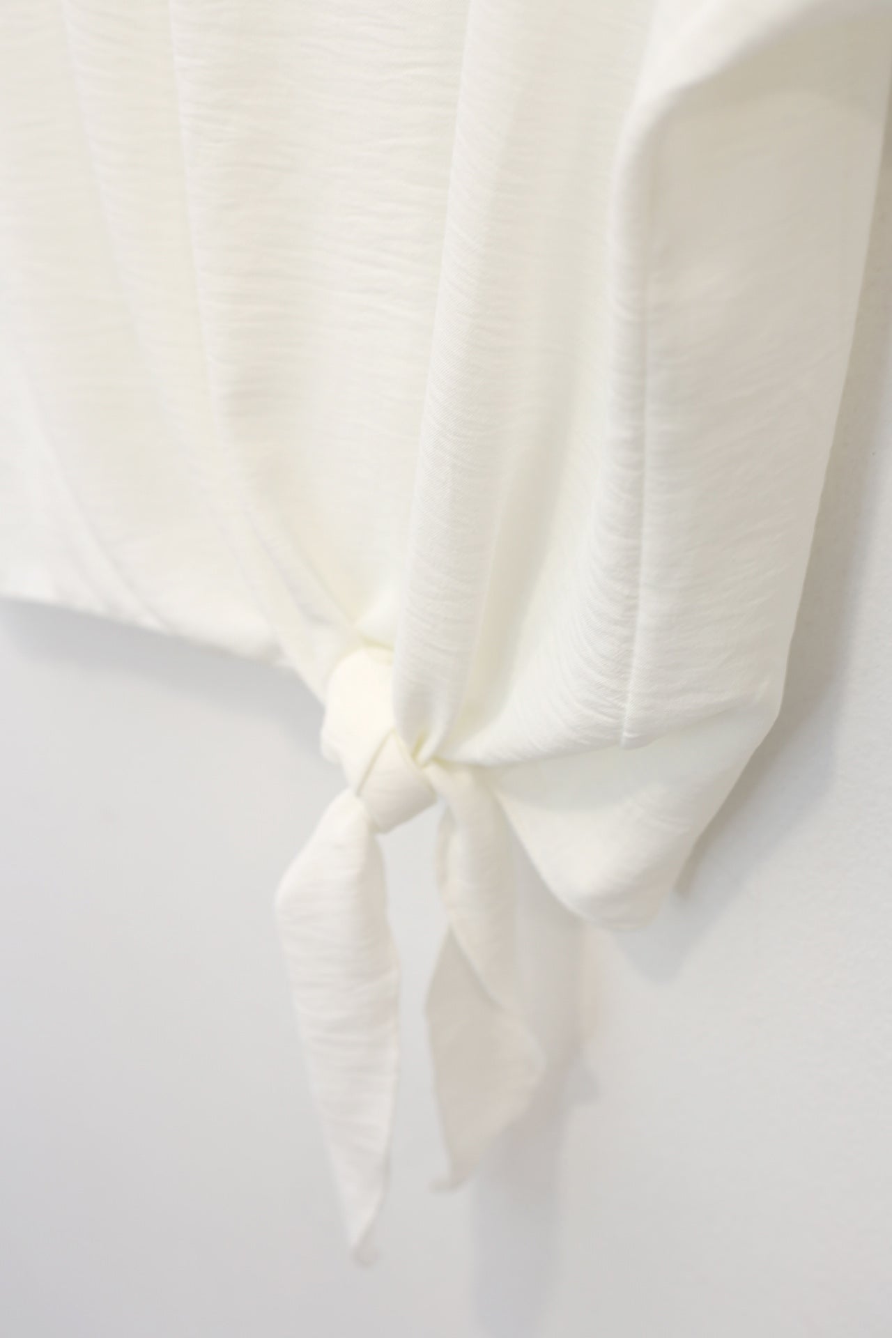 Blusa fluida nudo