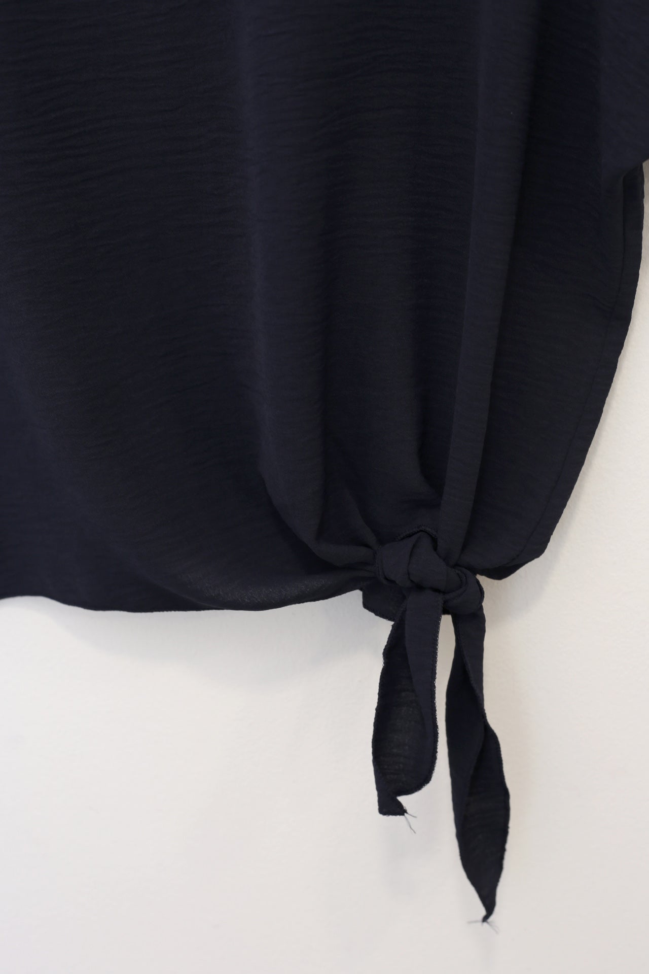 Blusa fluida nudo