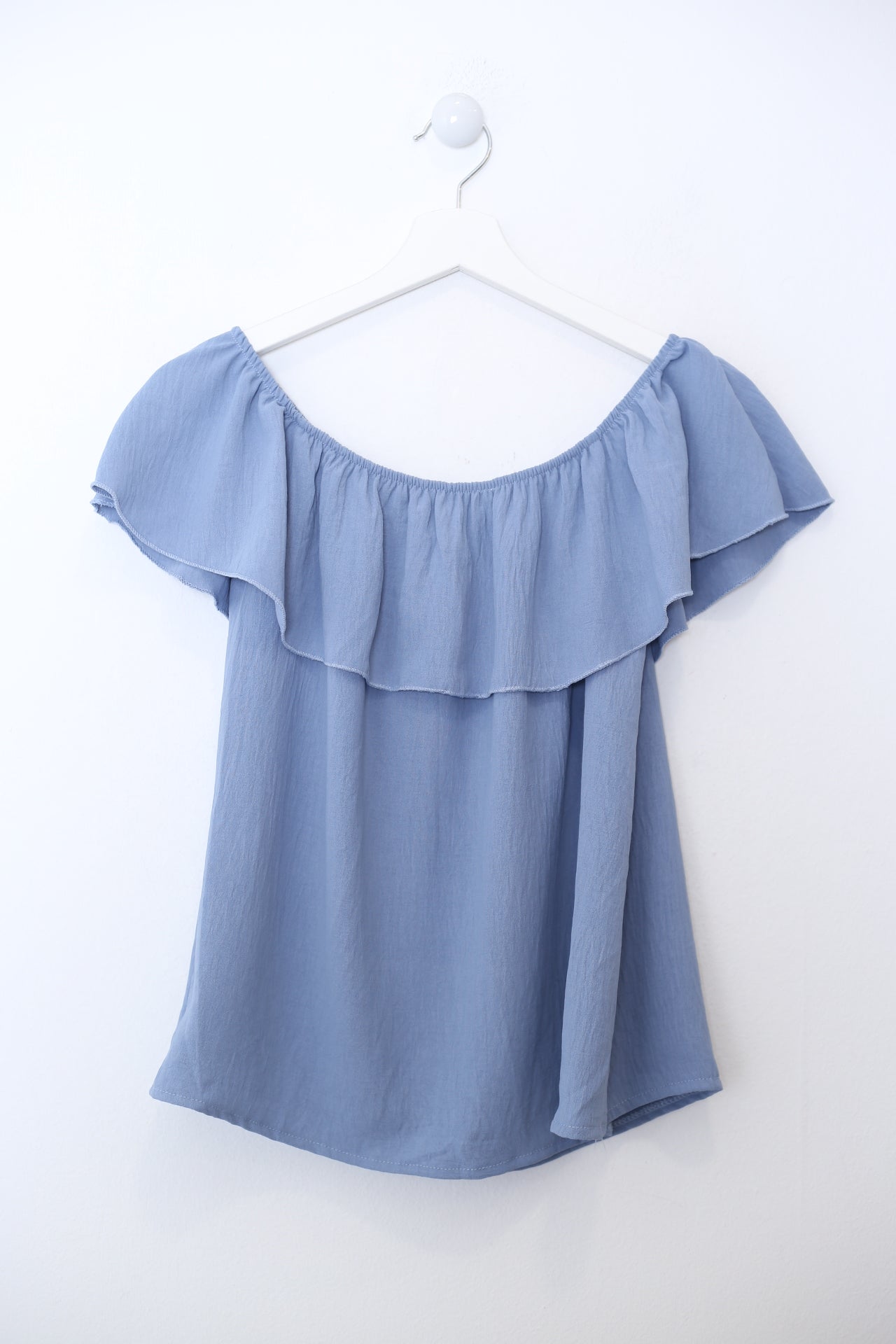 Blusa volante fluida