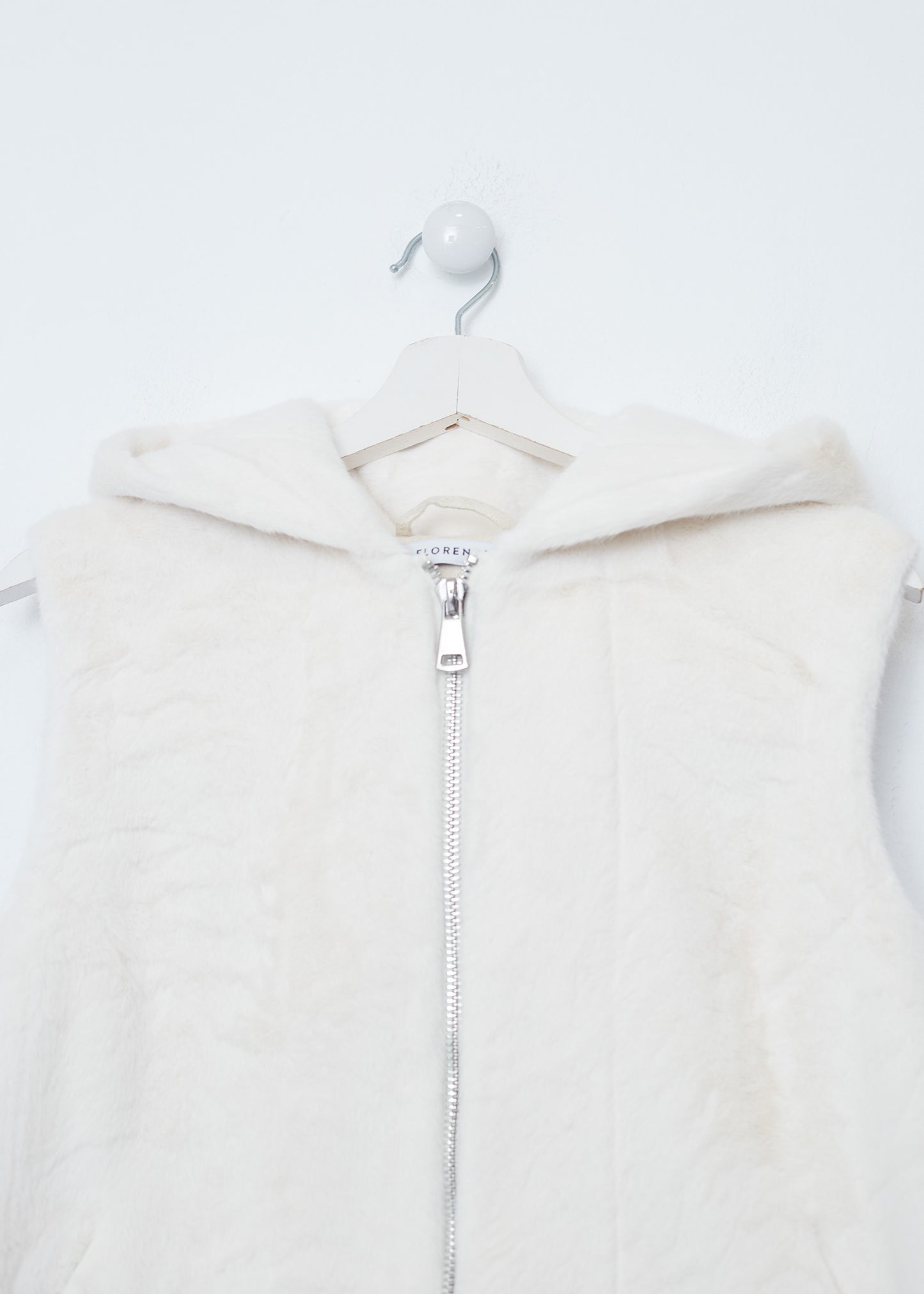 Faux fur vest with hood